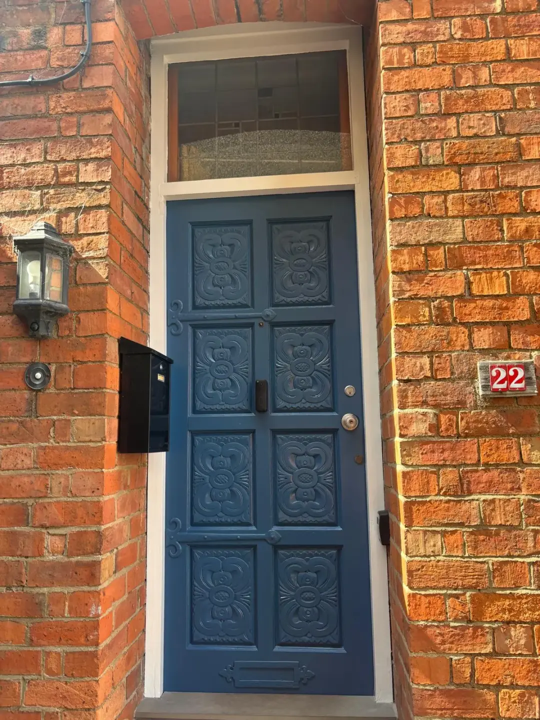 Bay-front exterior and blue door — Door finish